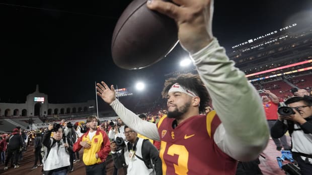 Caleb Williams celebrates a USC win. The Bears appear intent on supporting their new QB better, whether it's Williams or someone else.